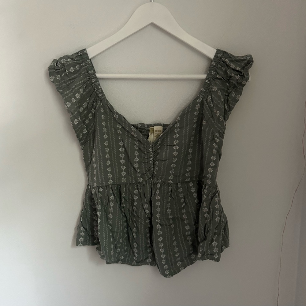 Green floral blouse